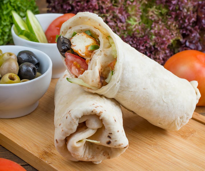 Spicy chicken wrap with fresh vegetables